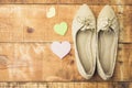girl shoes over wooden deck floor. Royalty Free Stock Photo