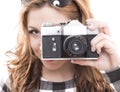 GIRL IS SHOOTING WITHA A RETRO CAMERA Royalty Free Stock Photo