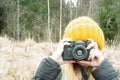 Girl shoots on a vintage film camera