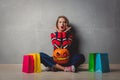 Girl with shopping bags and Halloween pumpkin Royalty Free Stock Photo