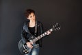 Girl with short hair in leather jacket