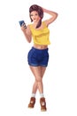 Girl in shorts, messages smartphone, isolated