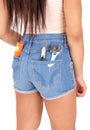 Girl in shorts with tools.