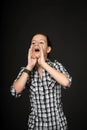 Girl shouts using hands Royalty Free Stock Photo