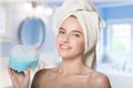 Girl in shower with blue bath wisp