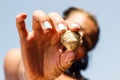 Girl Showing Founded Shell of Mussle Royalty Free Stock Photo