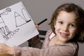 Girl showing her drawing Royalty Free Stock Photo