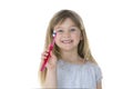 Girl showing her toothbrush