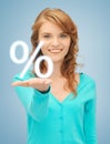 Girl showing sign of percent in her hand Royalty Free Stock Photo