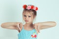 Girl showing thumbs down gesture Royalty Free Stock Photo