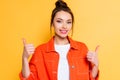 Girl showing thumbs up while looking Royalty Free Stock Photo