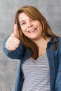 Girl showing thumbs up - okay Royalty Free Stock Photo