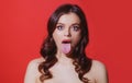 Girl showing tongue. Naughty teenage girl sticking out tongue. People emotions, reactions, feelings and attitude