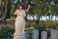 Girl shows hand gesture as philosophers in ancient Greece