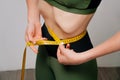 The girl is sick with anorexia. Close up of female ribs in a thin ugly female body, bulging ribs Royalty Free Stock Photo