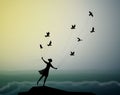 Girl silhouette is flying and holding pigeons above the storm waves, marine storm landscape, fly in the dream, shadows,