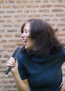 Girl singing on her hair brush Royalty Free Stock Photo