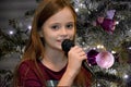 Girl sings christmas songs