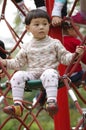 Girl sit on cable ladder