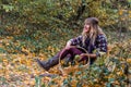 girl siting in forest