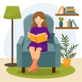 The girl sits in a chair and reads a book. Living room interior with armchair, floor lamp and book shelf. Royalty Free Stock Photo