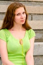 A girl sits on the dock Royalty Free Stock Photo