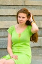 A girl sits on the dock Royalty Free Stock Photo