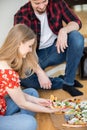 The girl and the boy ordered pizza with lunch delivery. Royalty Free Stock Photo