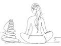 A girl sits in a lotus position with Latza stones in one line on a white background.