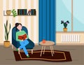The girl is sitting in a chair and reading a book.