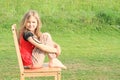 Girl sitting on chair