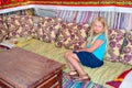 Girl sitting on the couch Royalty Free Stock Photo