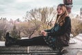 Girl sitting on edge of Belvedere Castle at Central Park in Manhattan, New York City Royalty Free Stock Photo