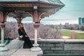 Girl sitting on edge of Belvedere Castle at Central Park in Manhattan, New York City Royalty Free Stock Photo