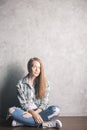 Girl sitting on floor Royalty Free Stock Photo