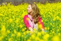 Girl sitting in flowers