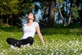 Girl Sitting on Grass