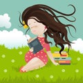 Girl sitting on grass reading a book Royalty Free Stock Photo