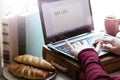 Girl sitting with a laptop Royalty Free Stock Photo