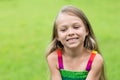 Girl sitting on the lawn Royalty Free Stock Photo