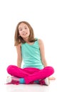 Girl sitting with legs crossed Royalty Free Stock Photo