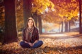 Girl sitting park autumn Royalty Free Stock Photo