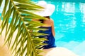 Girl sitting by the pool Royalty Free Stock Photo