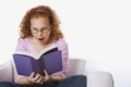 Girl sitting reading book Royalty Free Stock Photo