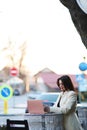 A girl sitting in a restaurant on the street Royalty Free Stock Photo