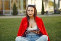 Girl sitting in a university campus use a tablet