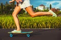 Girl skateboarder legs