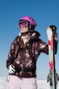 Girl skier with skis