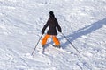 Girl skiing in the snow in winter