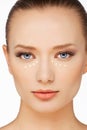 Girl with skin corrector around eye bags for even tone unblemished skin